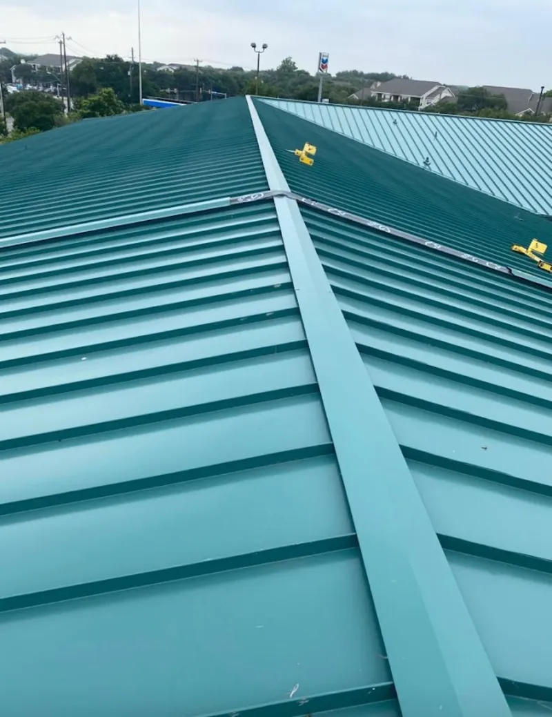 Green commercial metal roof ridge and valley for Metal Roof Repair in Baker